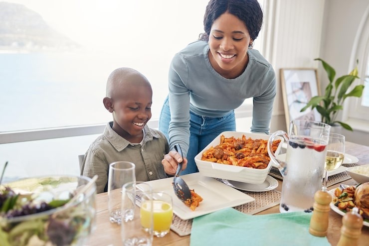 nigeria family serving kid